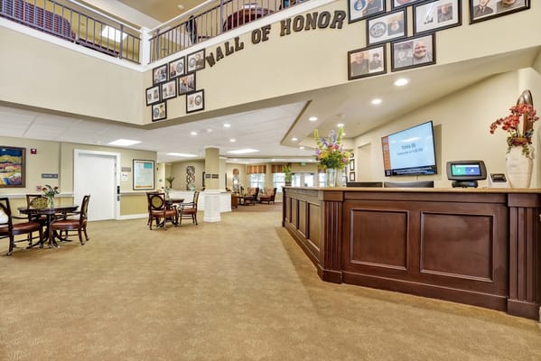 Interior view of the lobby at Dale Commons with a Wall of Honor.