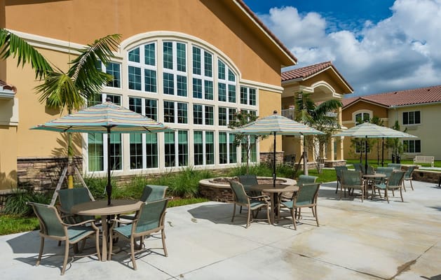 Outdoor seating area with umbrellas at the facility