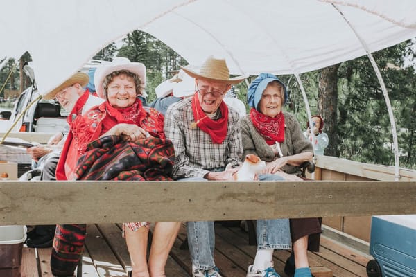 Four residents enjoying an outdoor ride together