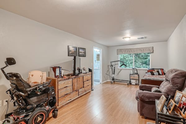 Interior view of a resident's room with furniture