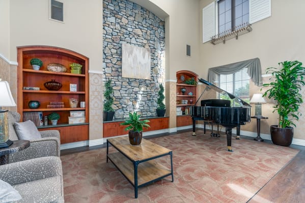 Elegant interior common area with a grand piano