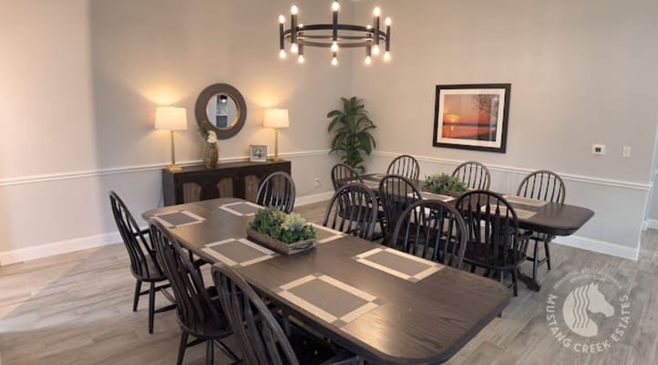 Dining room with large table and elegant decor