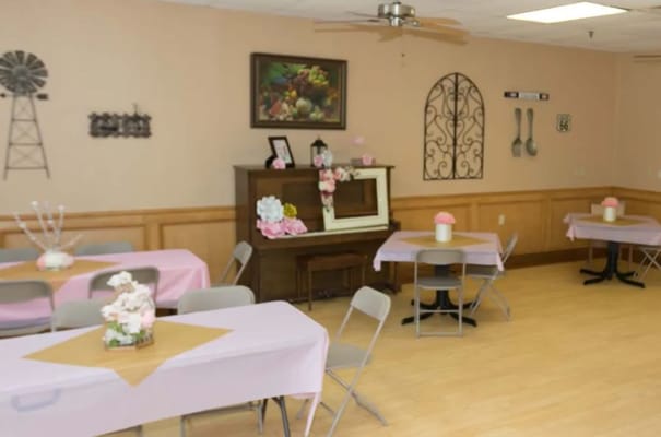 Interior view of a common area with decorated tables