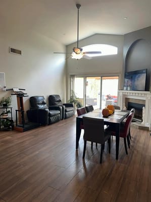 Interior view of a common area with seating and a dining table