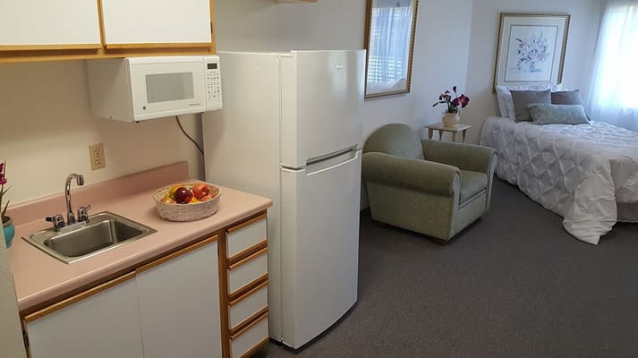 Interior view of a resident room with kitchenette