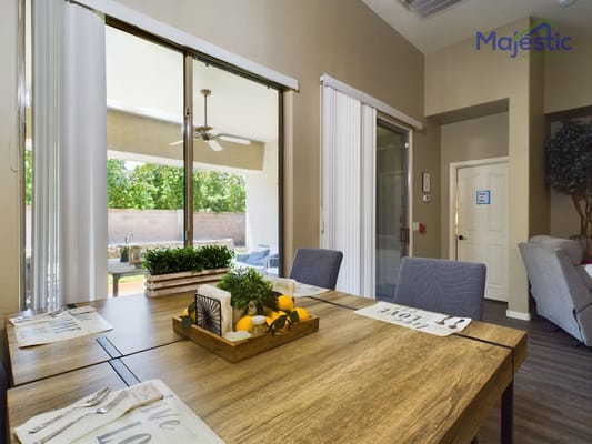 Bright common area with a dining setup and natural light