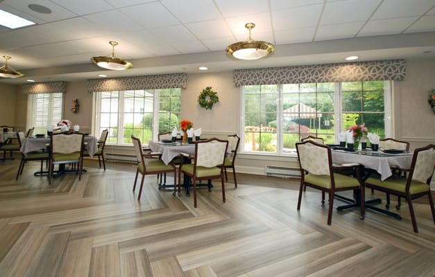 Bright dining room with tables and chairs