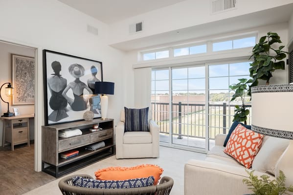 Cozy living room with modern decor and large windows