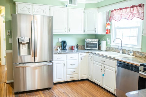 Bright kitchen space with stainless steel appliances