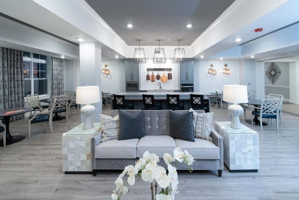 Bright and modern common area with seating and decor