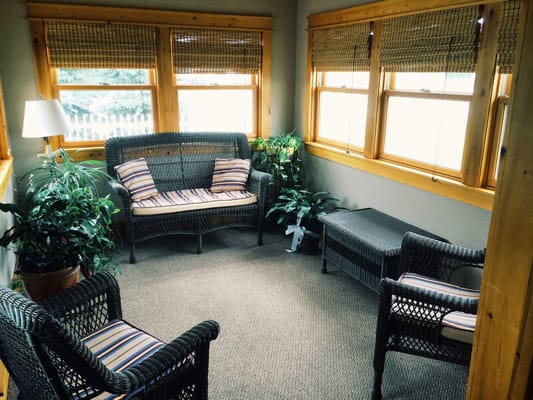 Cozy sitting area with plants and seating