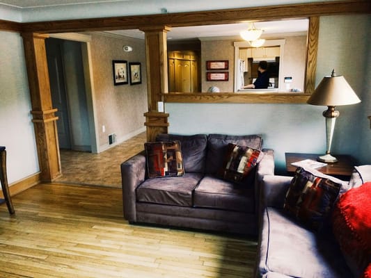 Cozy living room with a sofa and lamp