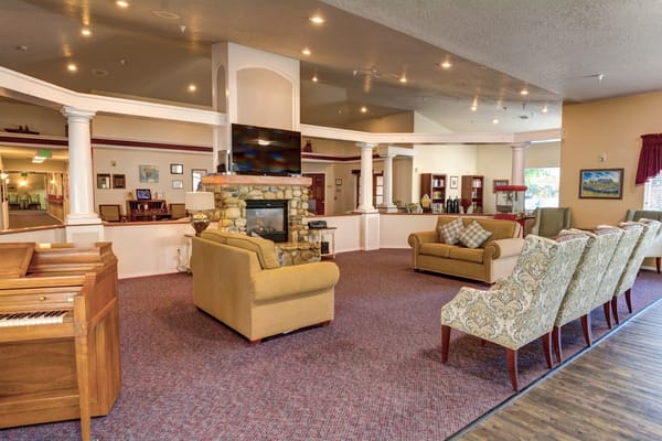 Interior common area with seating and fireplace