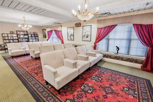 Cozy lounge area with plush seating and decorative rug