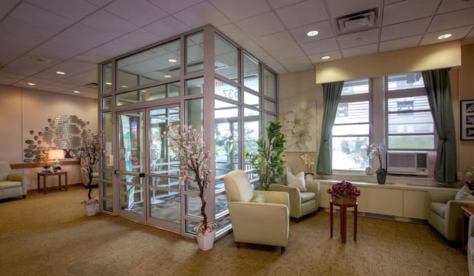 Bright common area with seating and decor