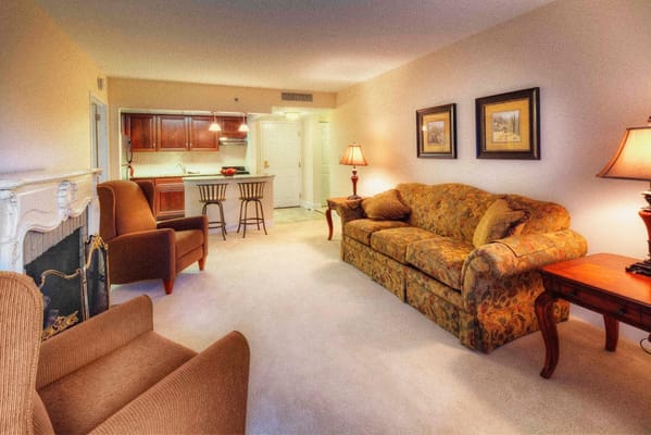 Cozy living room with comfortable seating and dining area