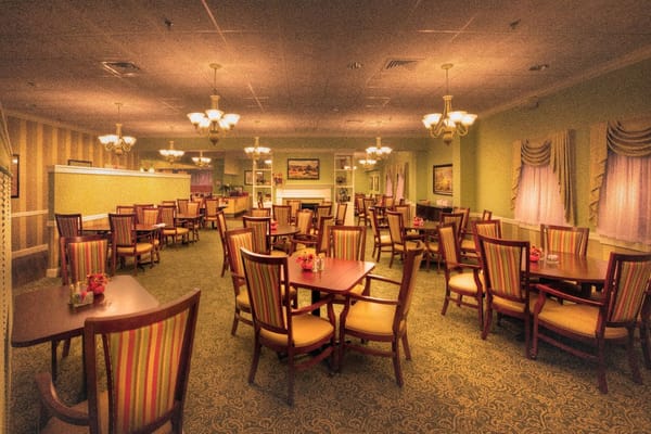 Bright dining room with tables and chairs