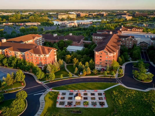 Aerial view of Radford Green Senior Living facility surrounded by greenery