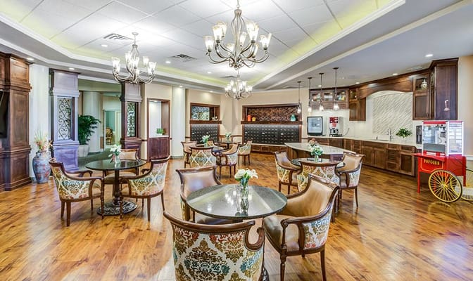 Brightly lit lounge area with elegant seating and decor.