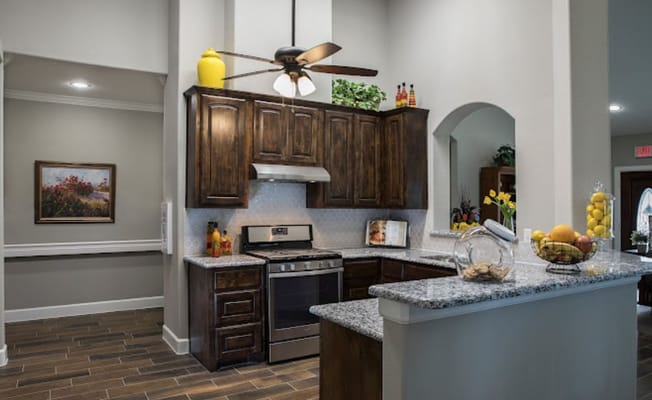 Stylish kitchen area with modern appliances and decor