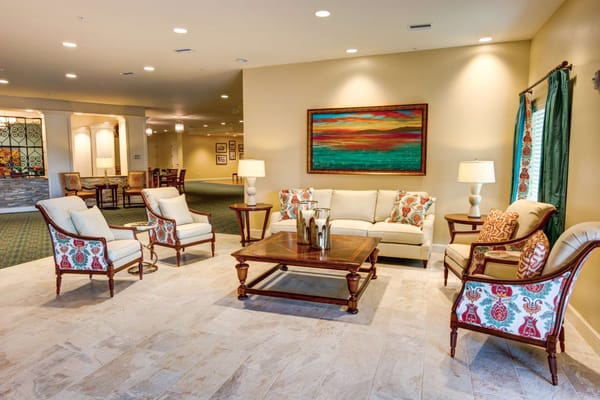 Inviting living room area with comfortable seating and artwork