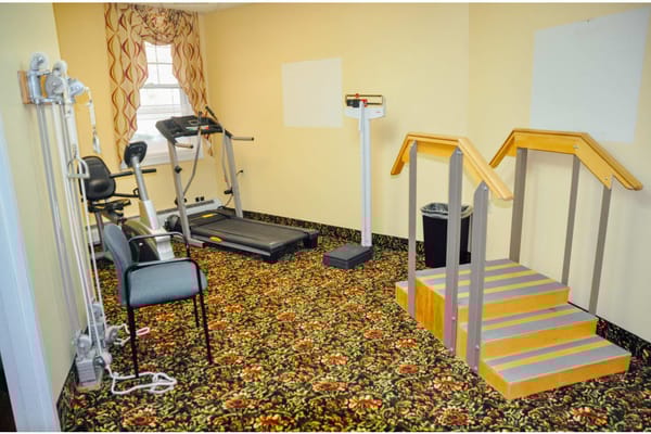 Gym equipment in a senior living facility fitness area