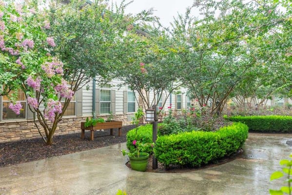 Lush garden area featuring blooming flowers and well-maintained shrubs