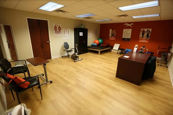 Interior view of therapy room with exercise equipment