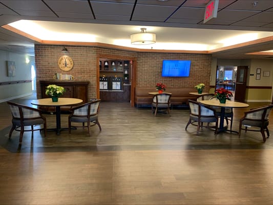 Interior view of the lobby with tables and chairs