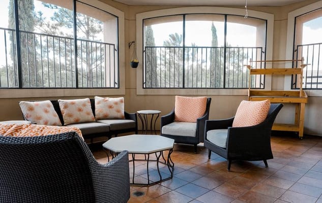 Cozy common area with seating and natural light