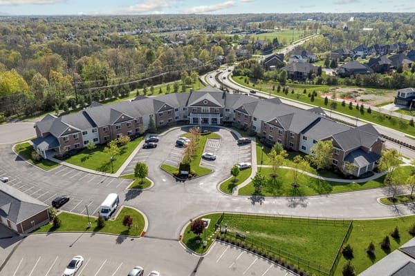 Aerial view of The Landing of Long Cove senior living facility with landscaped grounds.