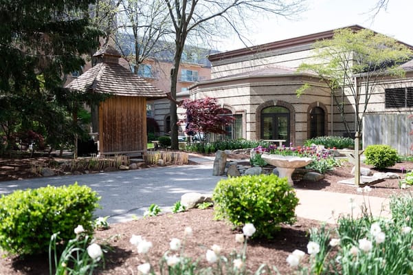 Outdoor space with garden and gazebo in a senior living facility
