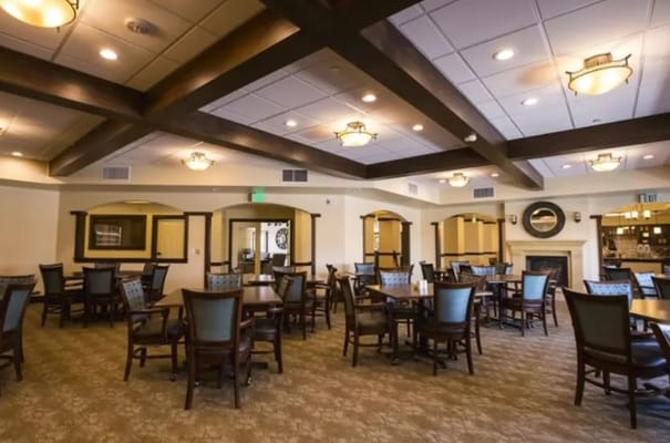 Interior view of a common area with tables and chairs