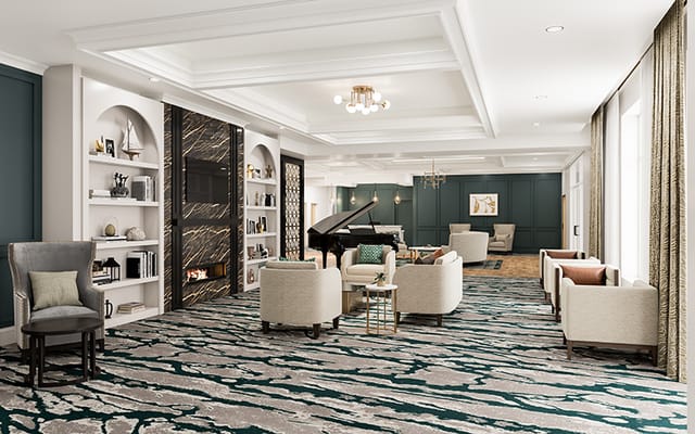Lounge area with plush seating and a grand piano