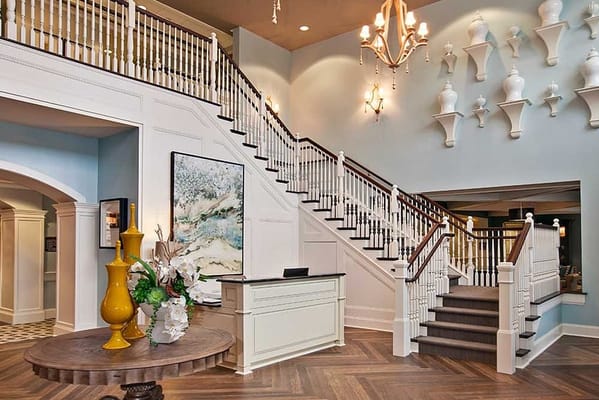 Elegant lobby interior with staircase and decor