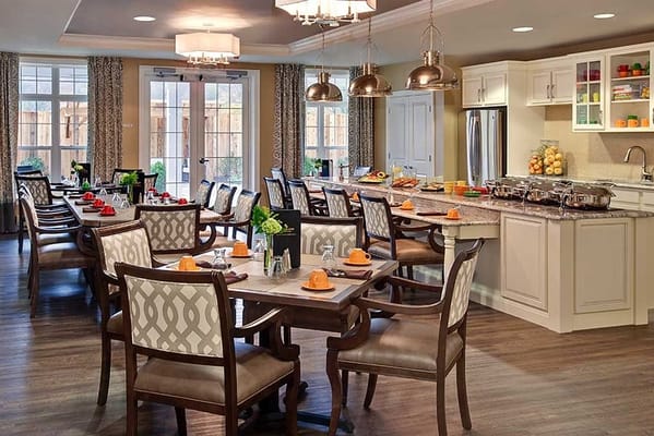 Bright dining room with tables set for lunch