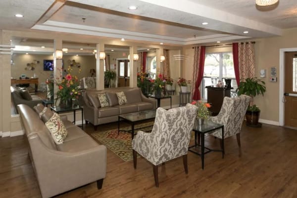 Comfortable lobby with seating and floral decor