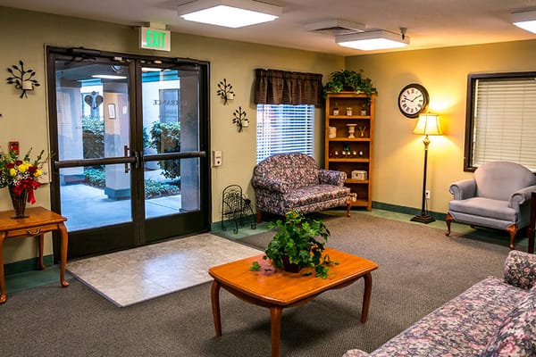 Bright common area with seating and decor