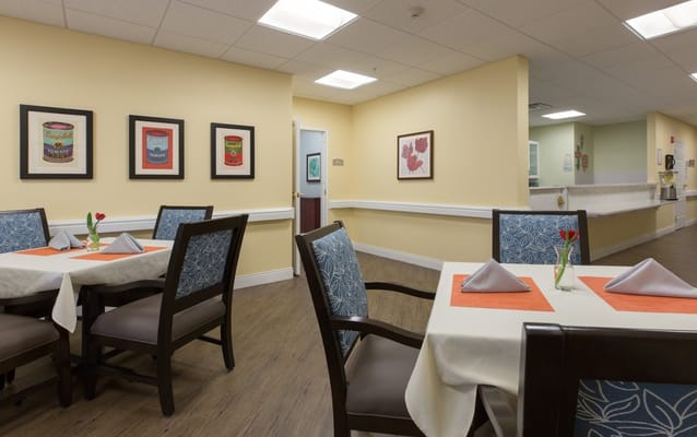Bright and welcoming dining area with tables and chairs