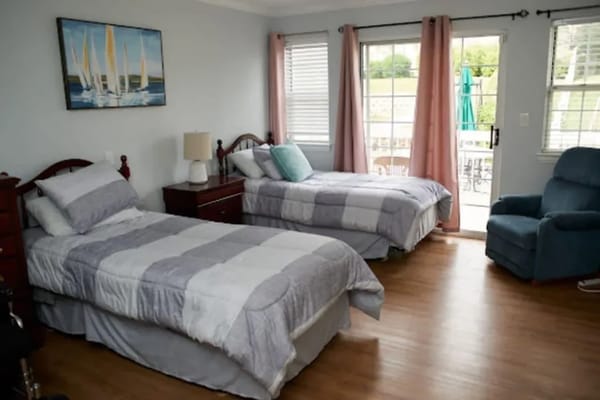 Bright interior of a resident room with twin beds