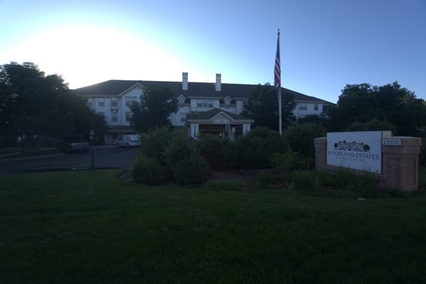Exterior view of Woodland Estates Senior Living building