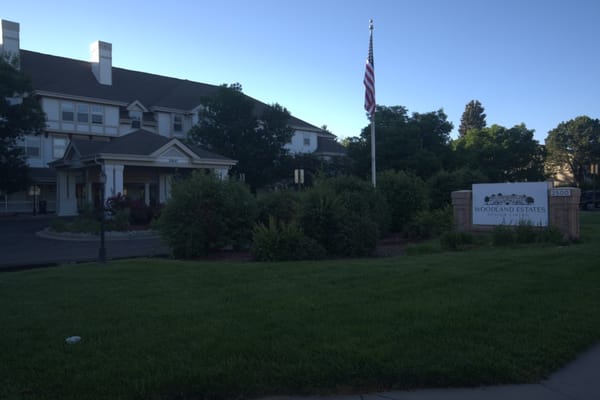 Exterior view of Woodland Estates Senior Living entrance