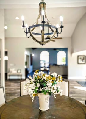Charming interior dining area with floral centerpiece