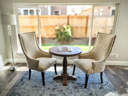 Cozy seating area with a table by a window