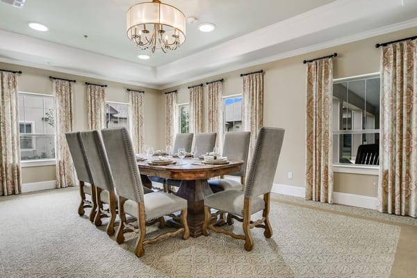 Elegant dining room setup with a large wooden table