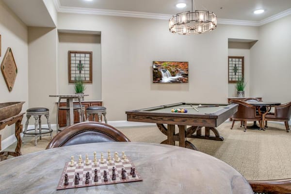 Interior common area with game tables and seating