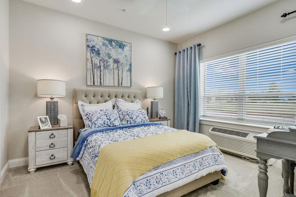 Cozy resident bedroom with soft lighting and decor