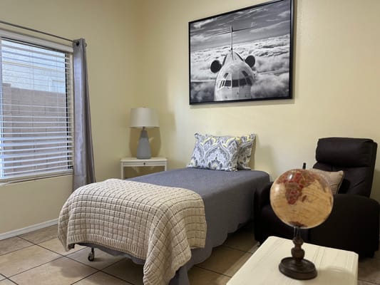 Private resident room with a bed and decor