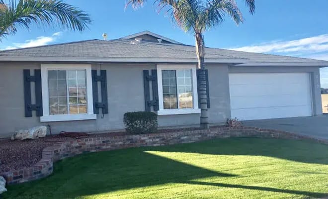 Exterior view of a house with landscaping