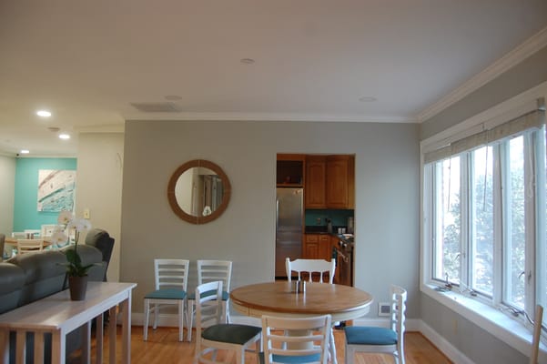 Bright common area with seating and natural light